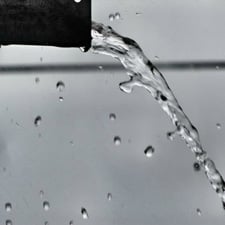 Water spilling out from a pipe